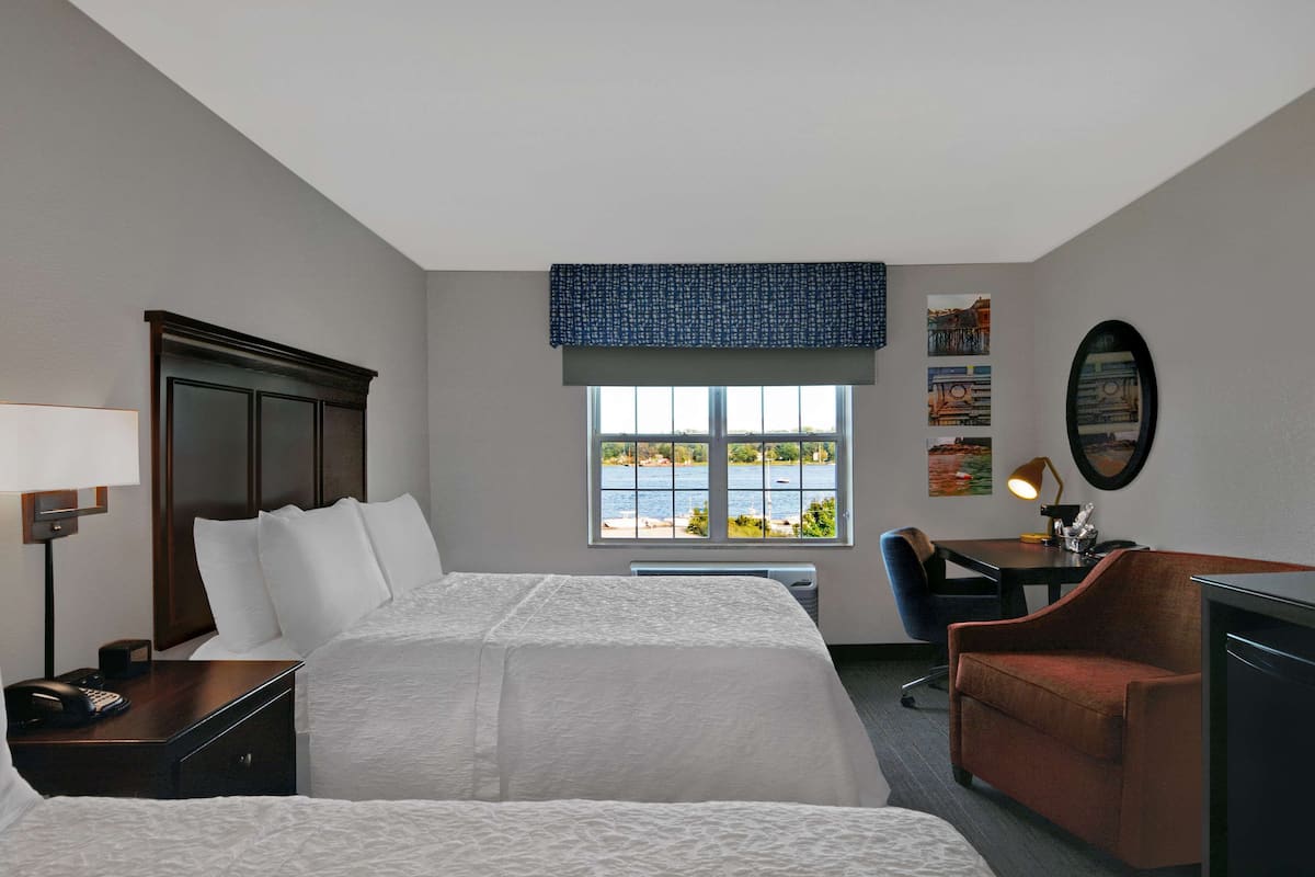 room, 2 queen beds, river view | in-room safe, free cots/infant beds, free rollaway beds, free wifi