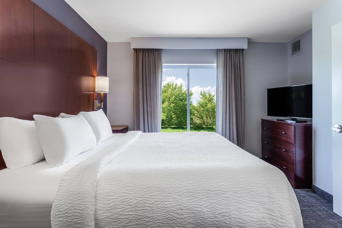 desk, laptop workspace, blackout curtains, iron/ironing board