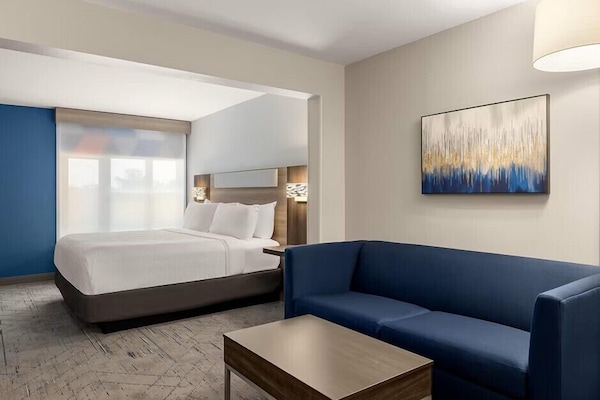 Down comforters, pillowtop beds, in-room safe, desk