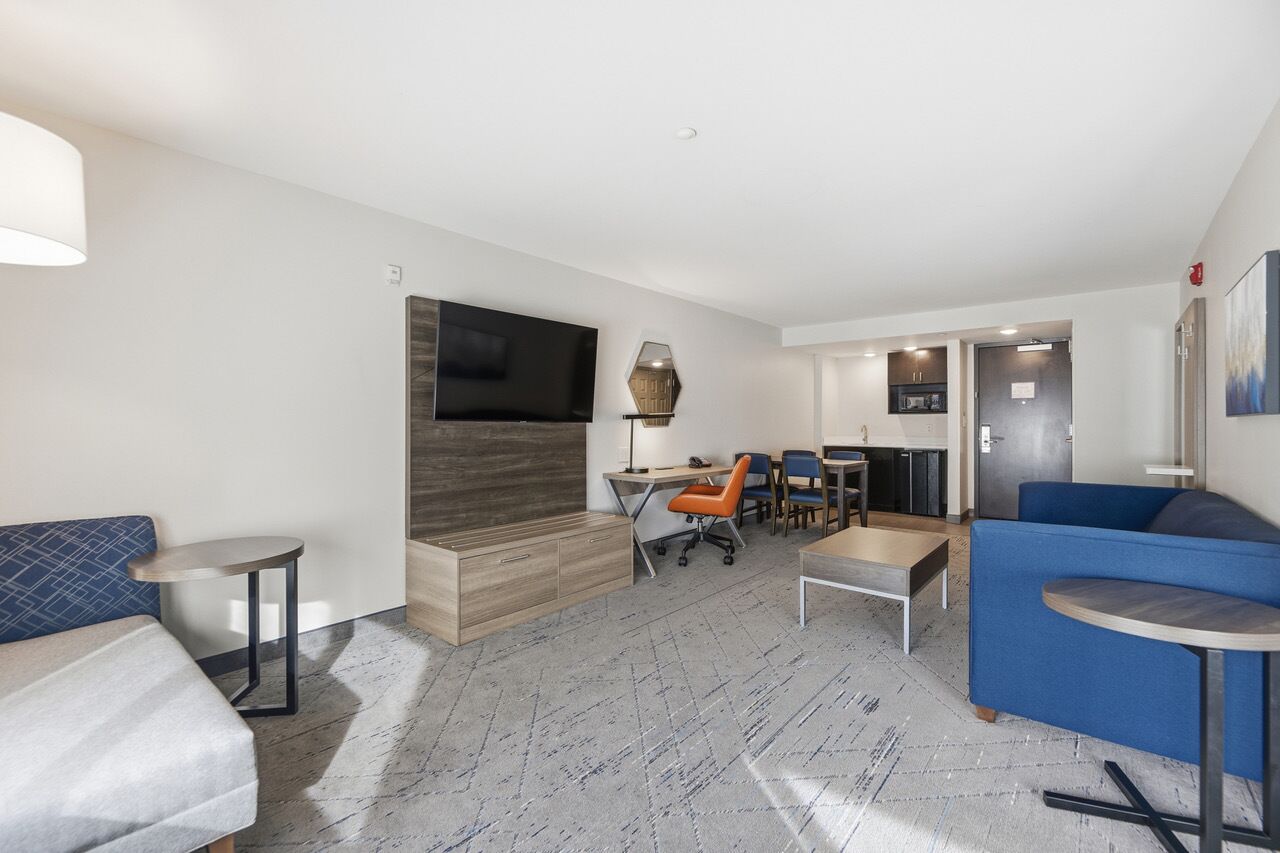 Down comforters, pillowtop beds, in-room safe, desk