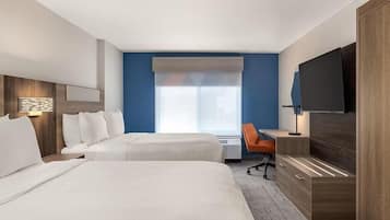 Down comforters, pillowtop beds, in-room safe, desk