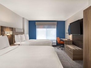 Down duvets, pillow-top beds, in-room safe, desk
