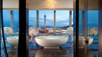 Separate tub and shower, eco-friendly toiletries, hair dryer, bathrobes