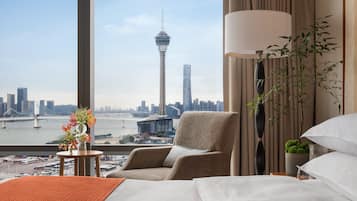 Premium bedding, down comforters, minibar, in-room safe