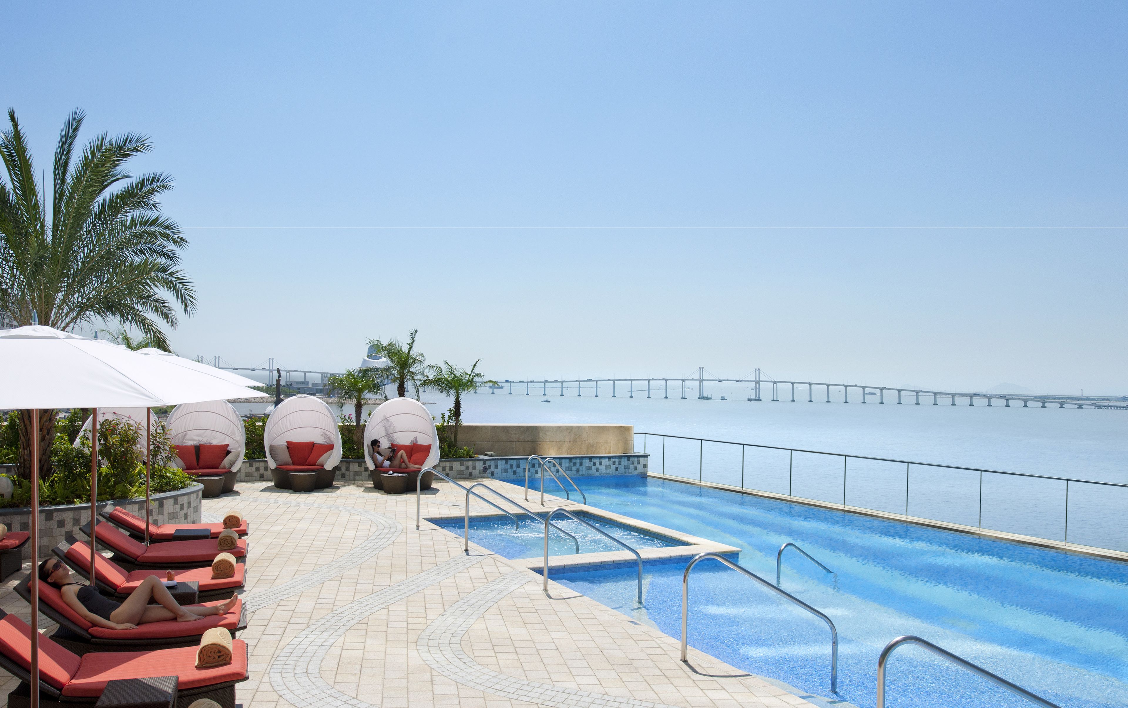 outdoor pool, open 8:00 am to 7:00 pm, pool loungers