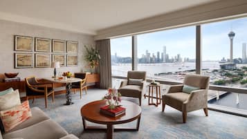 Deluxe Suite, 1 King Bed (Tower) | Living area | 42-inch plasma TV with cable channels, TV, DVD player