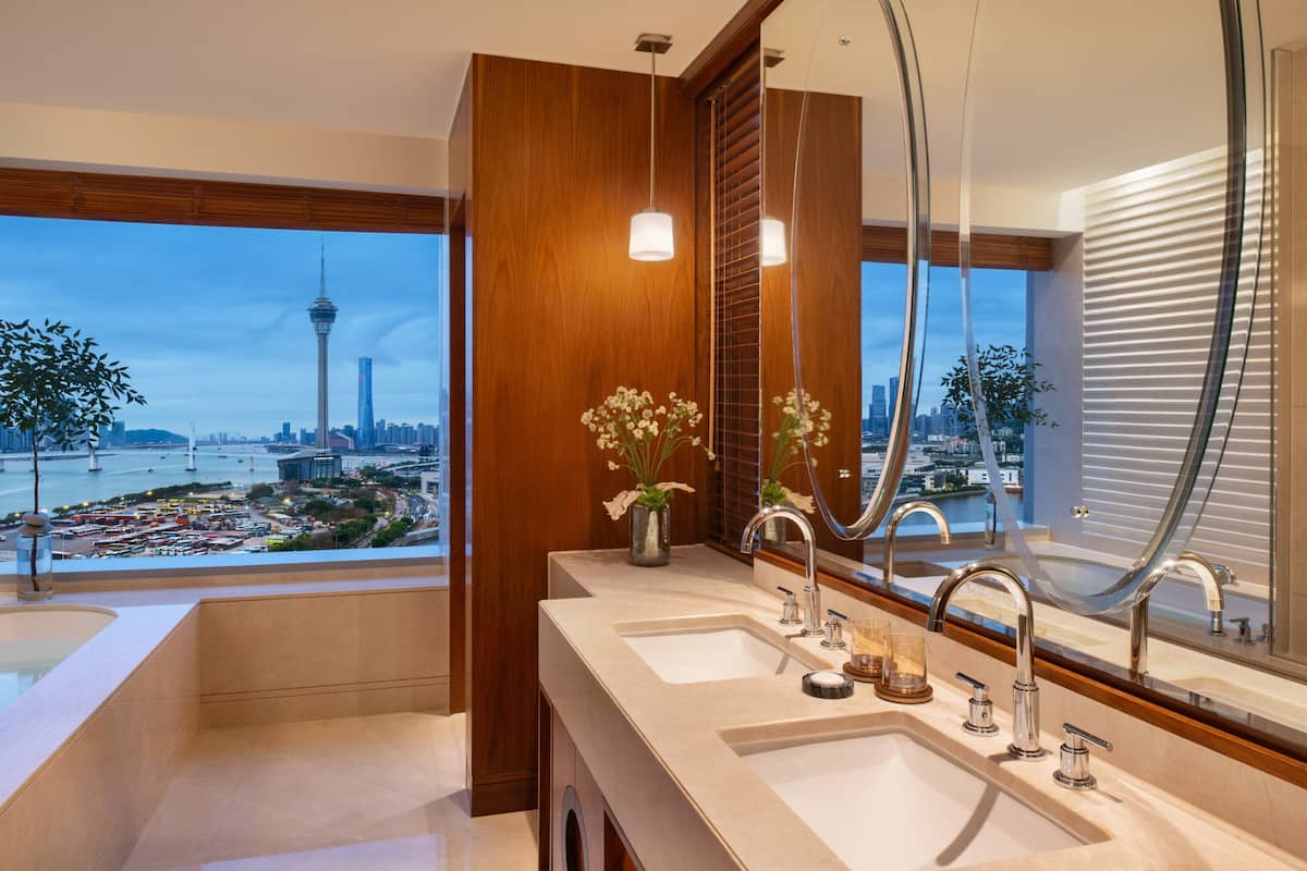 deluxe suite, 1 king bed (tower) | bathroom | separate bathtub and shower, eco-friendly toiletries, hair dryer