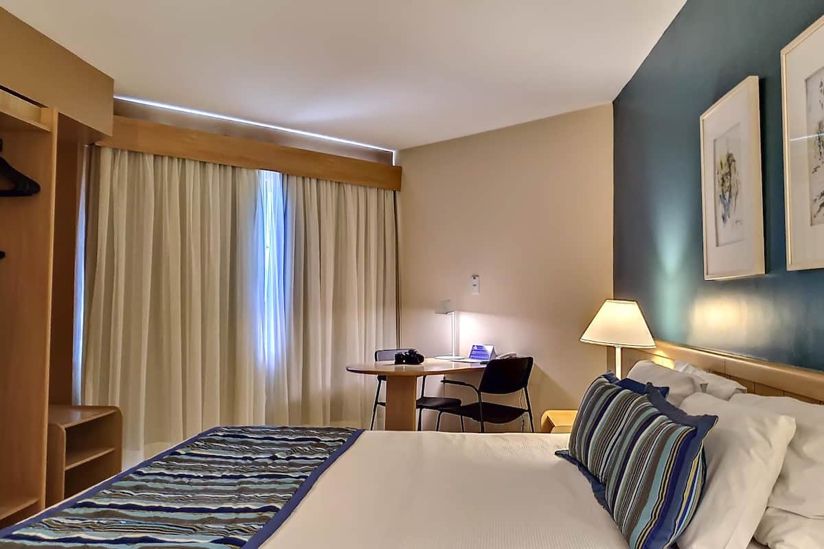 In-room safe, desk, laptop workspace, blackout curtains