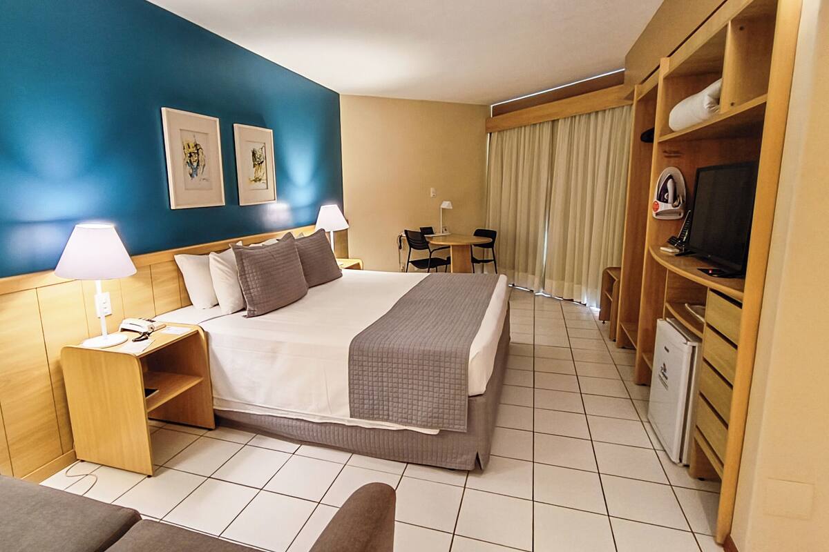 Deluxe Single Room | In-room safe, desk, laptop workspace, blackout curtains