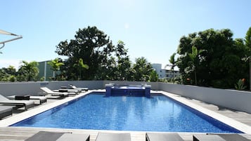 Outdoor pool, pool umbrellas, sun loungers