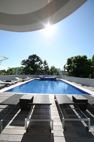 Outdoor pool, pool umbrellas, sun loungers