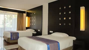 Minibar, desk, blackout drapes, iron/ironing board