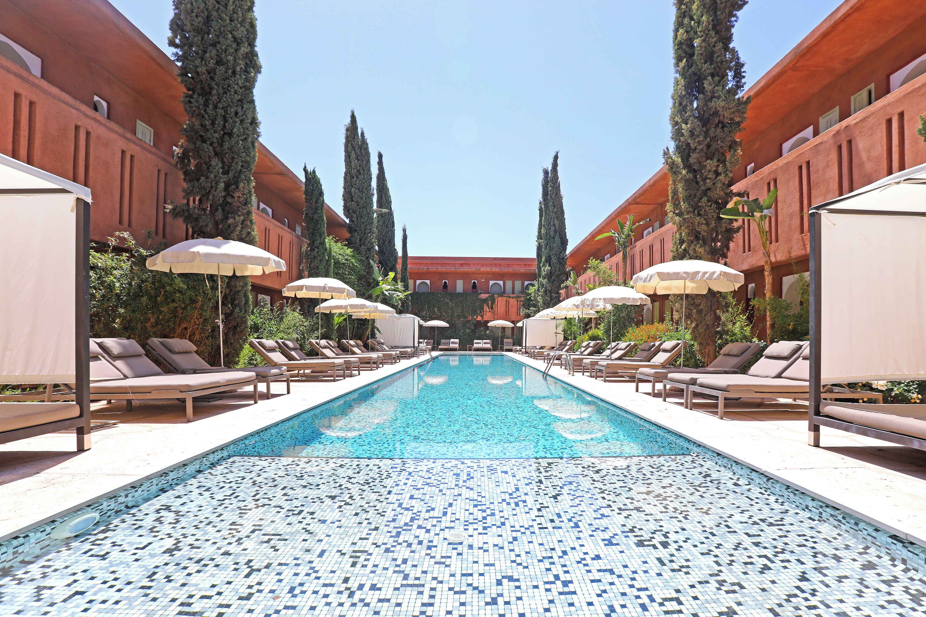 indoor pool, 2 outdoor pools, pool umbrellas