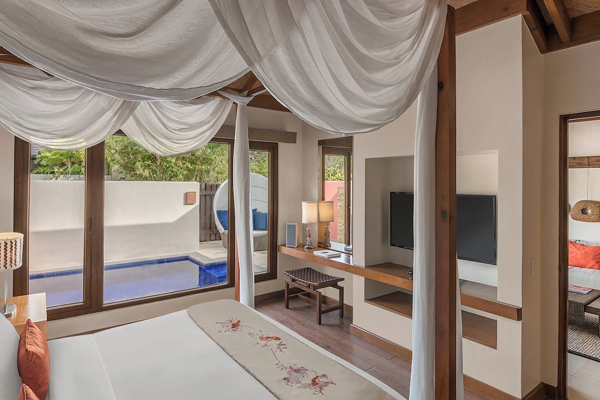 Premium bedding, down duvets, pillow-top beds, in-room safe