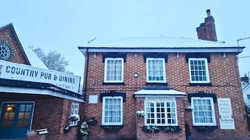 Experience the charm of this historic pub and dining establishment, offering a warm and inviting atmosphere.