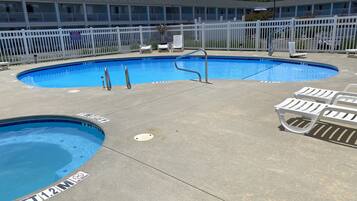 Seasonal outdoor pool, open 10 AM to 8 PM, pool loungers