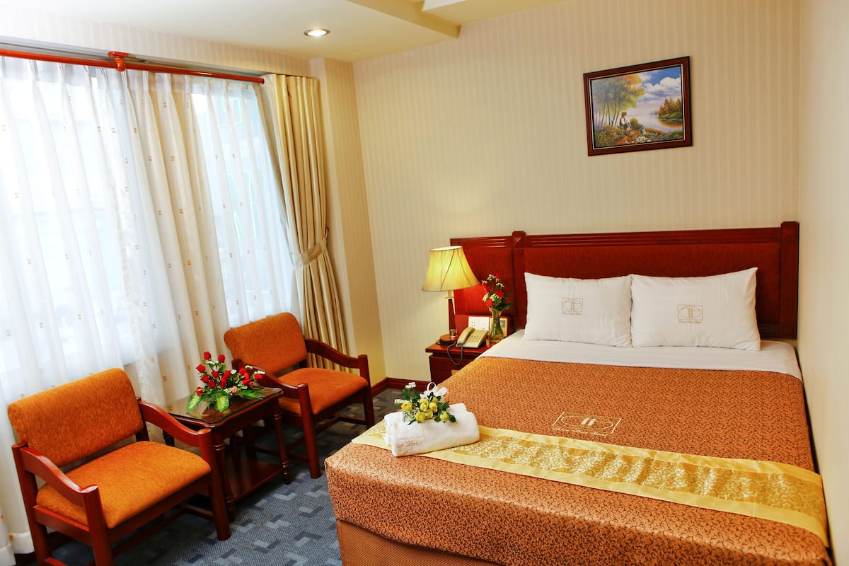 Superior City View | Minibar, in-room safe, desk, blackout drapes