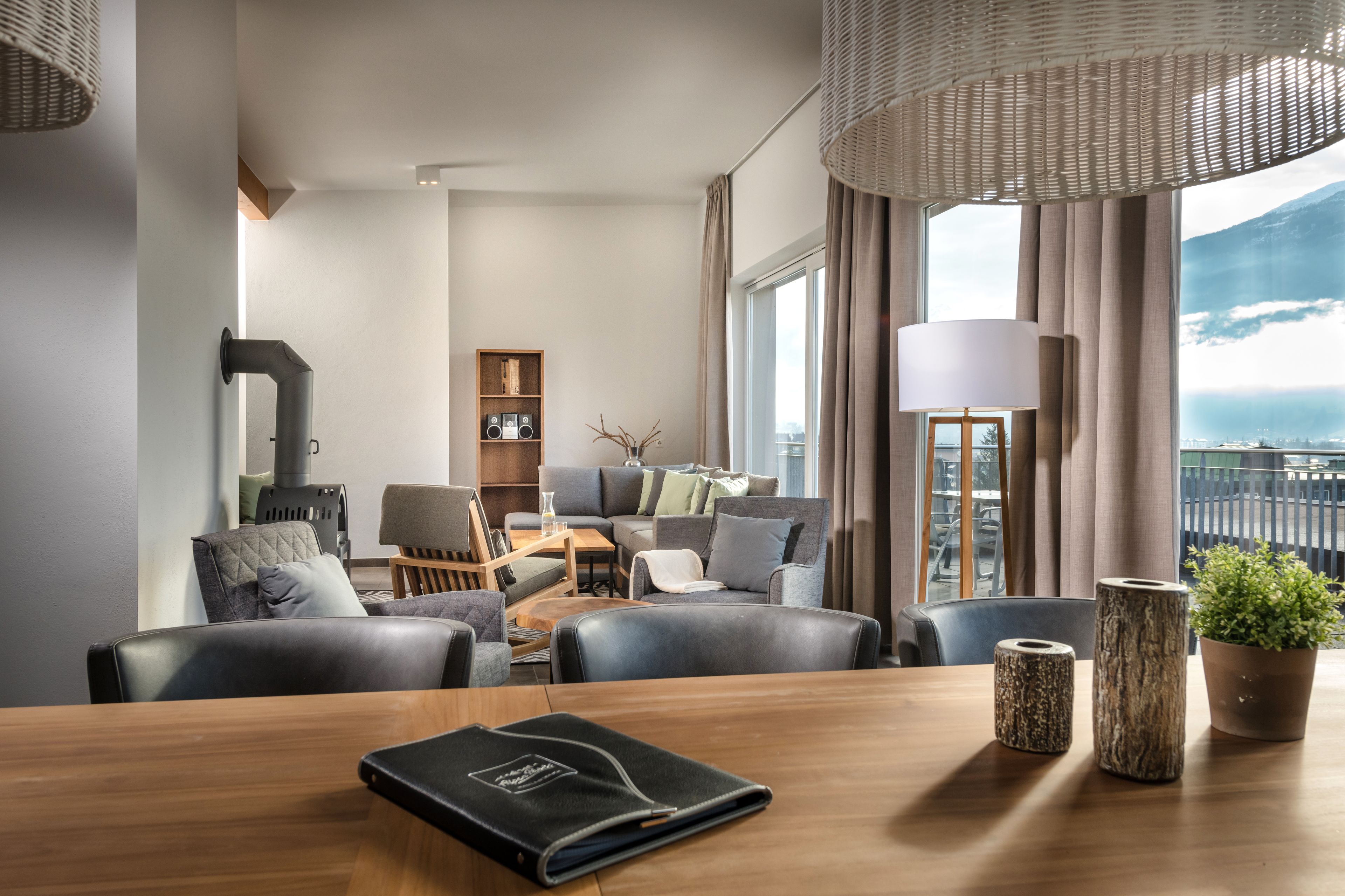 apartment, terrace, mountain view (alpine royal) | living area | lcd tv, fireplace