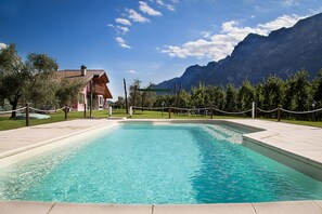 Seasonal outdoor pool, pool umbrellas, sun loungers