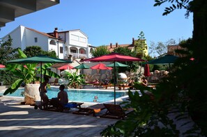 Outdoor pool, pool umbrellas, pool loungers