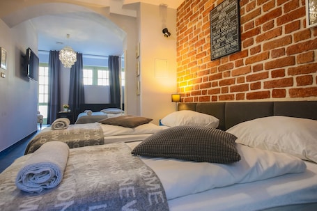 Standard Room, Private Bathroom (4 persons) | Living area | 36-inch TV with satellite channels