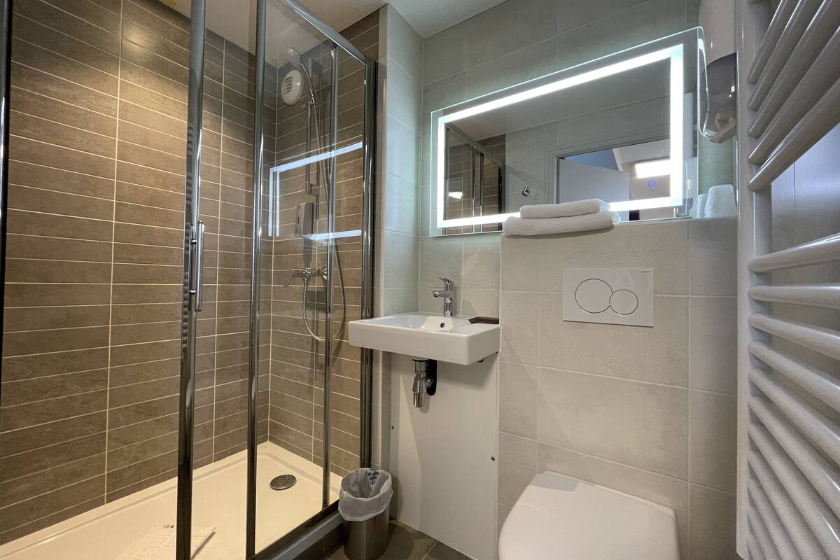 hair dryer, towels, soap, shampoo