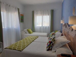 Triple Room | Pillowtop beds, minibar, in-room safe, individually decorated - Hotel Boutique Las Arenas (Santa Eulalia del Rio)