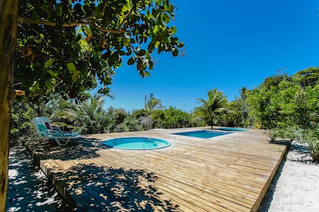 Outdoor pool, pool umbrellas, sun loungers