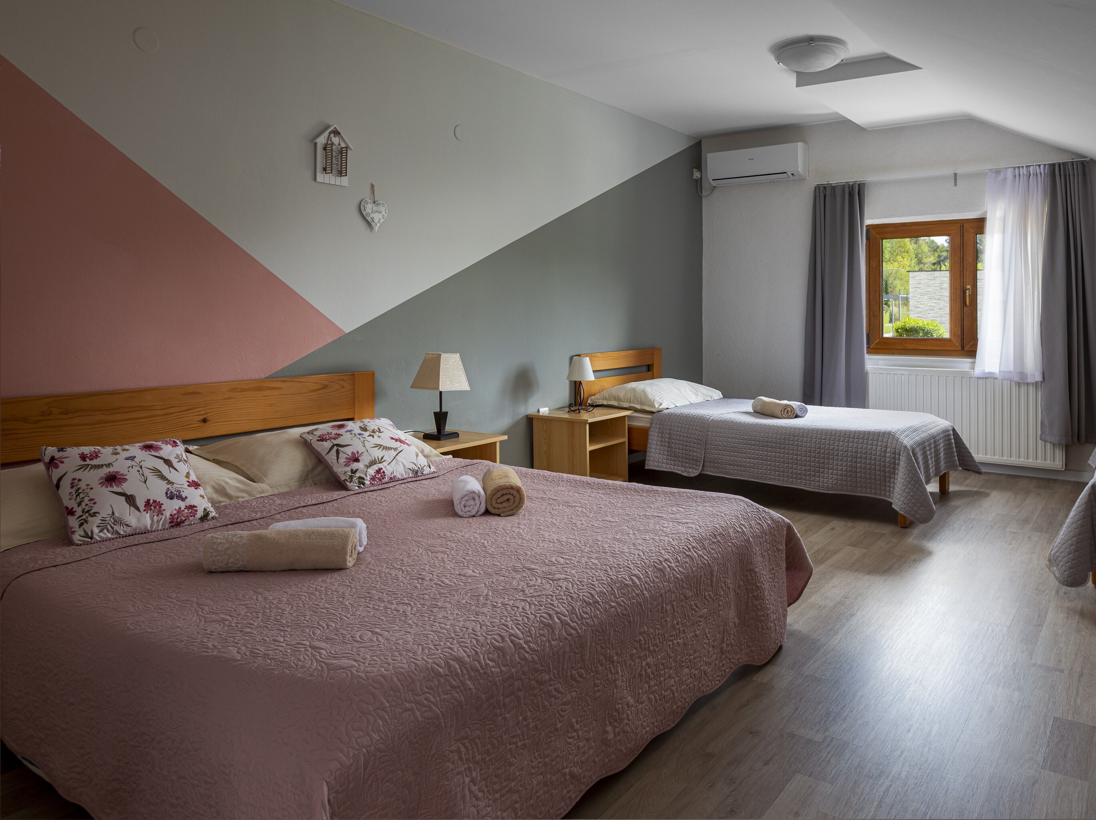 economy quadruple room (villa domagoj) | pillow-top beds, desk, laptop workspace, blackout curtains