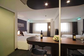 Superior Twin Room | In-room safe, desk, blackout drapes, iron/ironing board