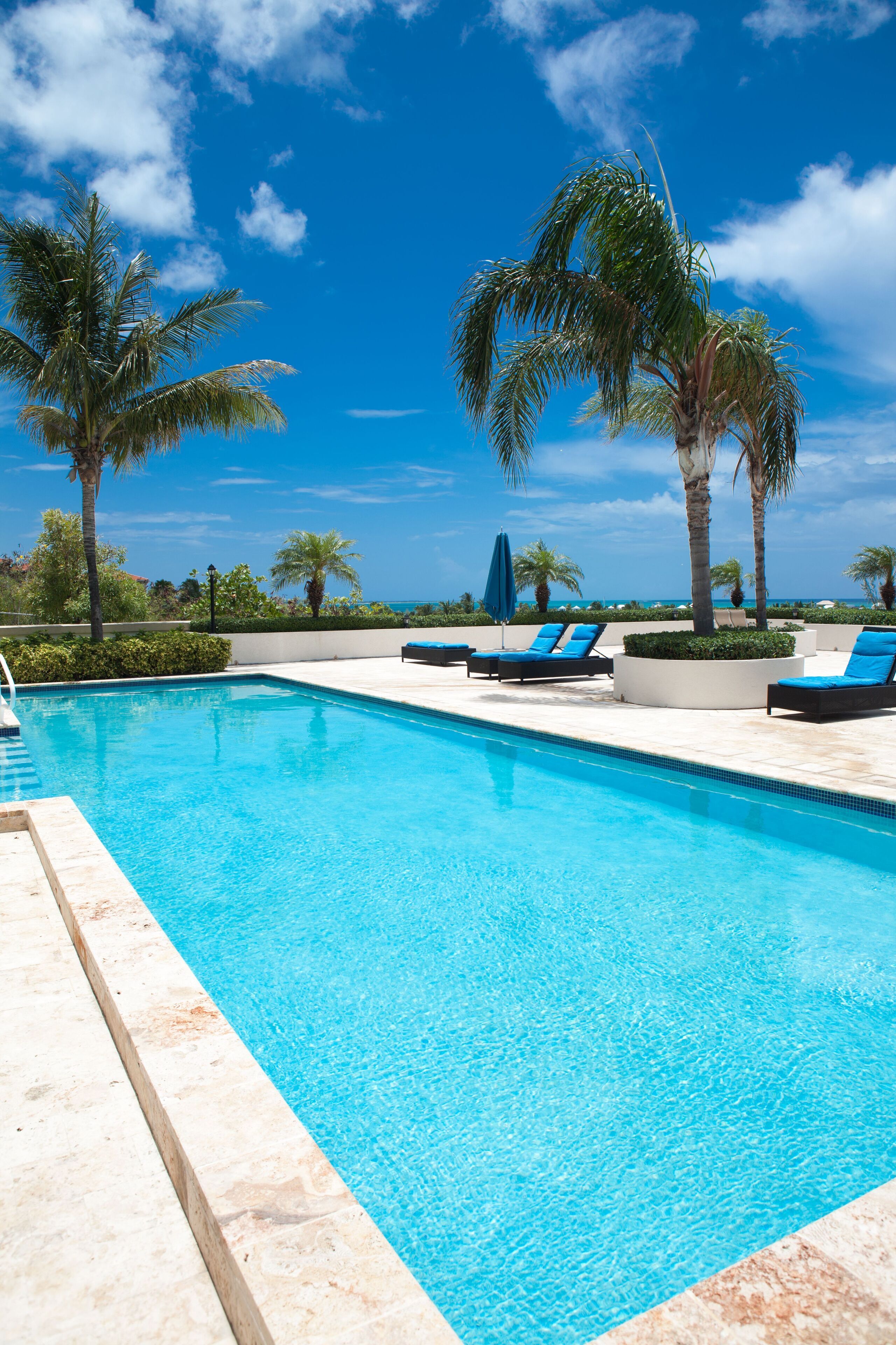 2 outdoor pools, pool umbrellas, pool loungers