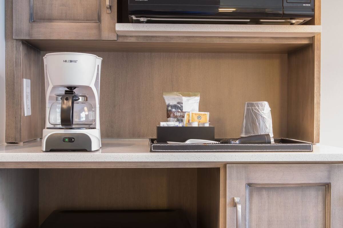 premium bedding, down duvets, pillow-top beds, in-room safe