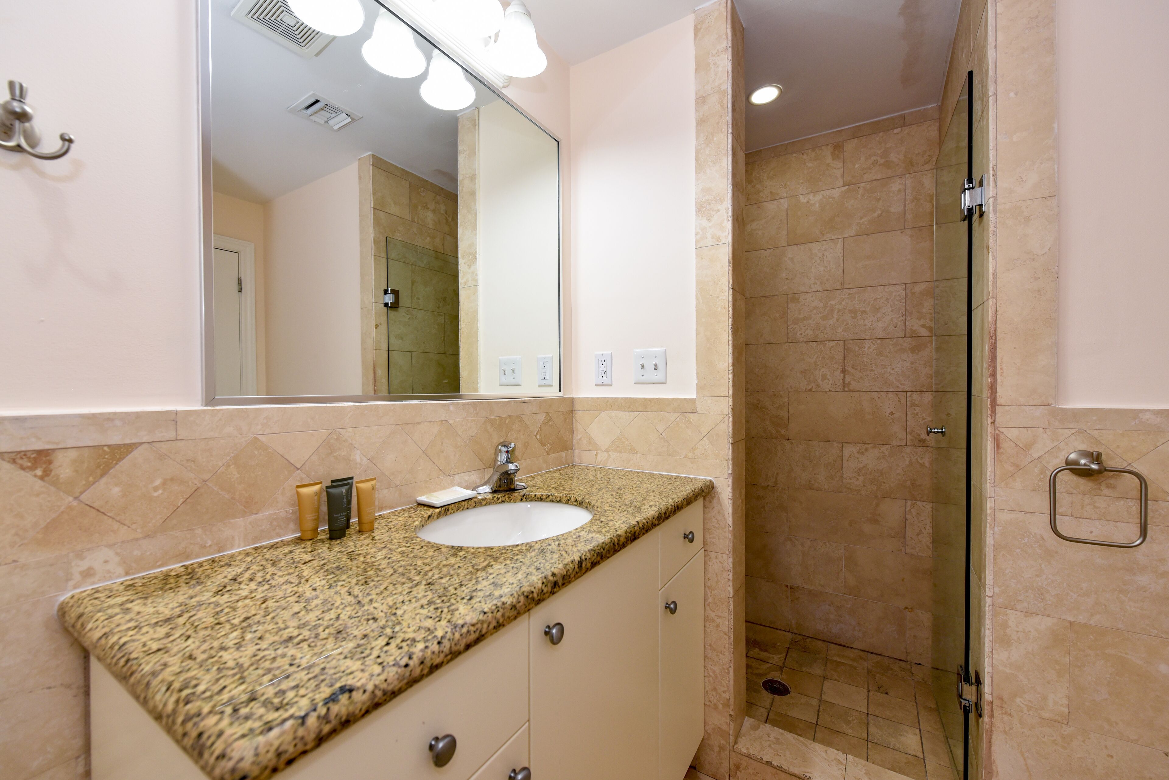 shower, free toiletries, hair dryer, towels