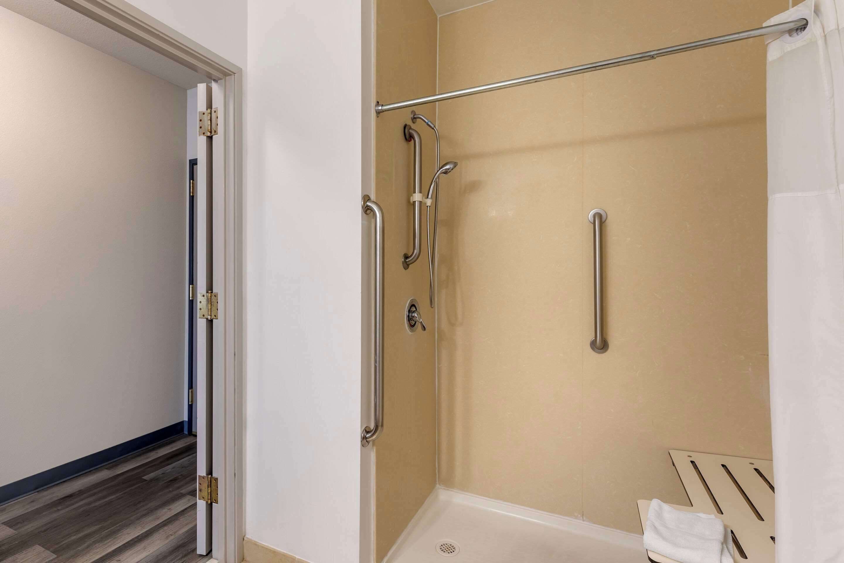 room, 1 king bed, accessible, non smoking (roll-in shower) | 1 bedroom, premium bedding, pillow-top beds, in-room safe