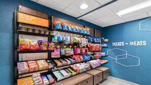A snack display with various brands and types of snacks. - Hampton Inn & Suites New Castle (New Castle)