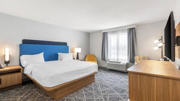 Habitación, 1 cama King size | Tabla de planchar con plancha, wifi gratis y ropa de cama