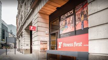 A building with a large 'Fitness First' sign, a 'F' logo, and a 'Platinum' designation.