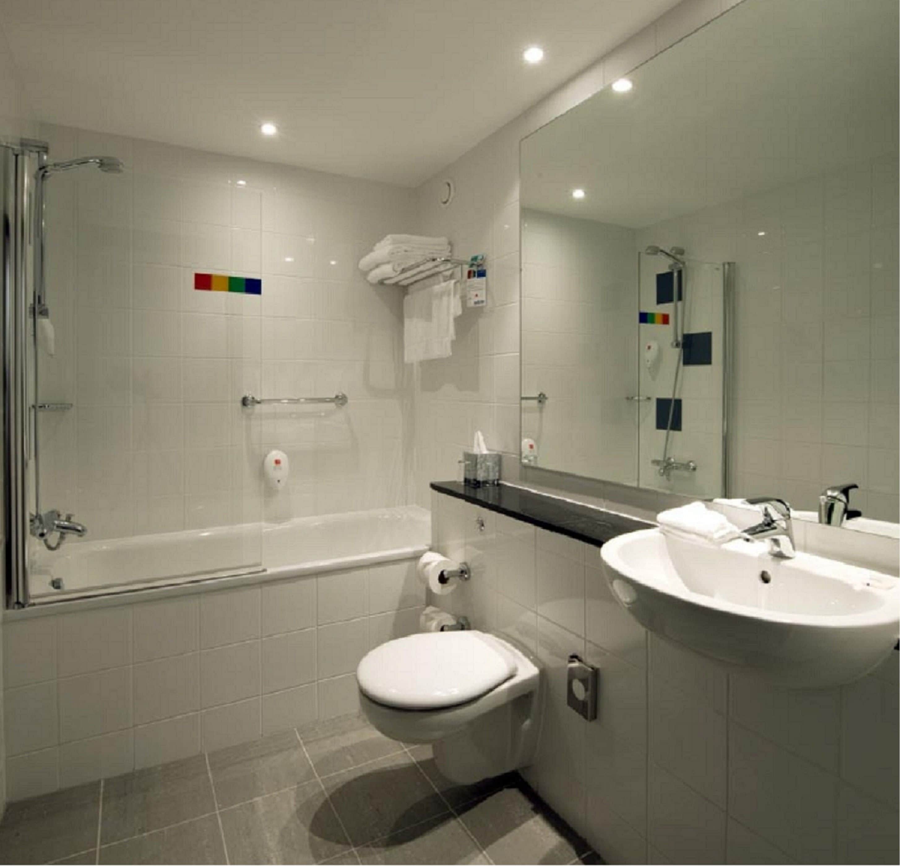 shower, free toiletries, hair dryer, slippers