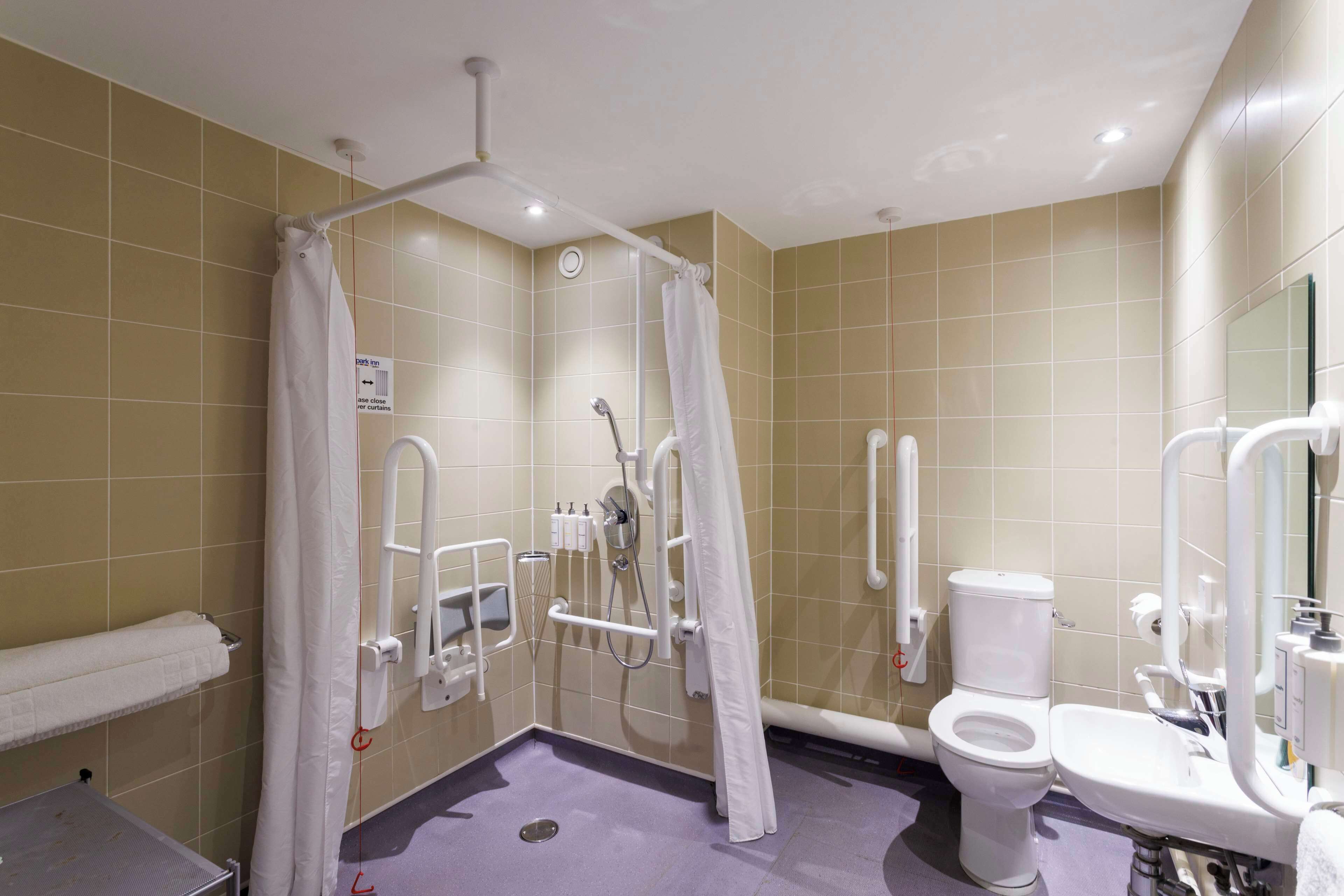 shower, free toiletries, hair dryer, slippers