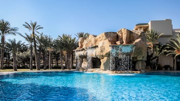 Indoor pool, outdoor pool, pool umbrellas