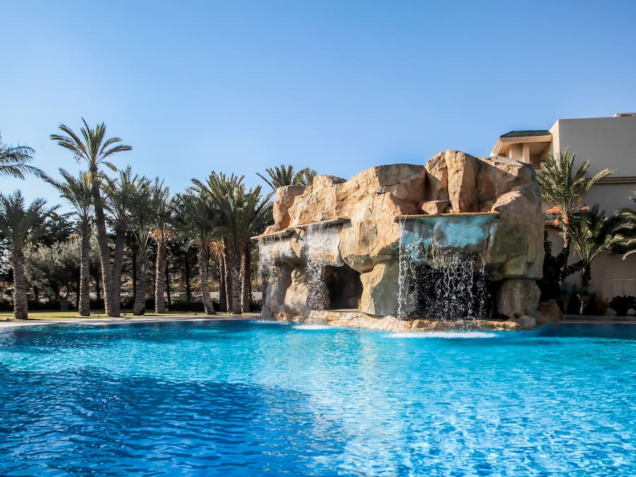 Indoor pool, outdoor pool, pool umbrellas