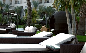 Indoor pool, outdoor pool, pool umbrellas