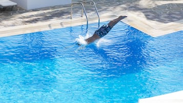 Outdoor pool, pool umbrellas, pool loungers