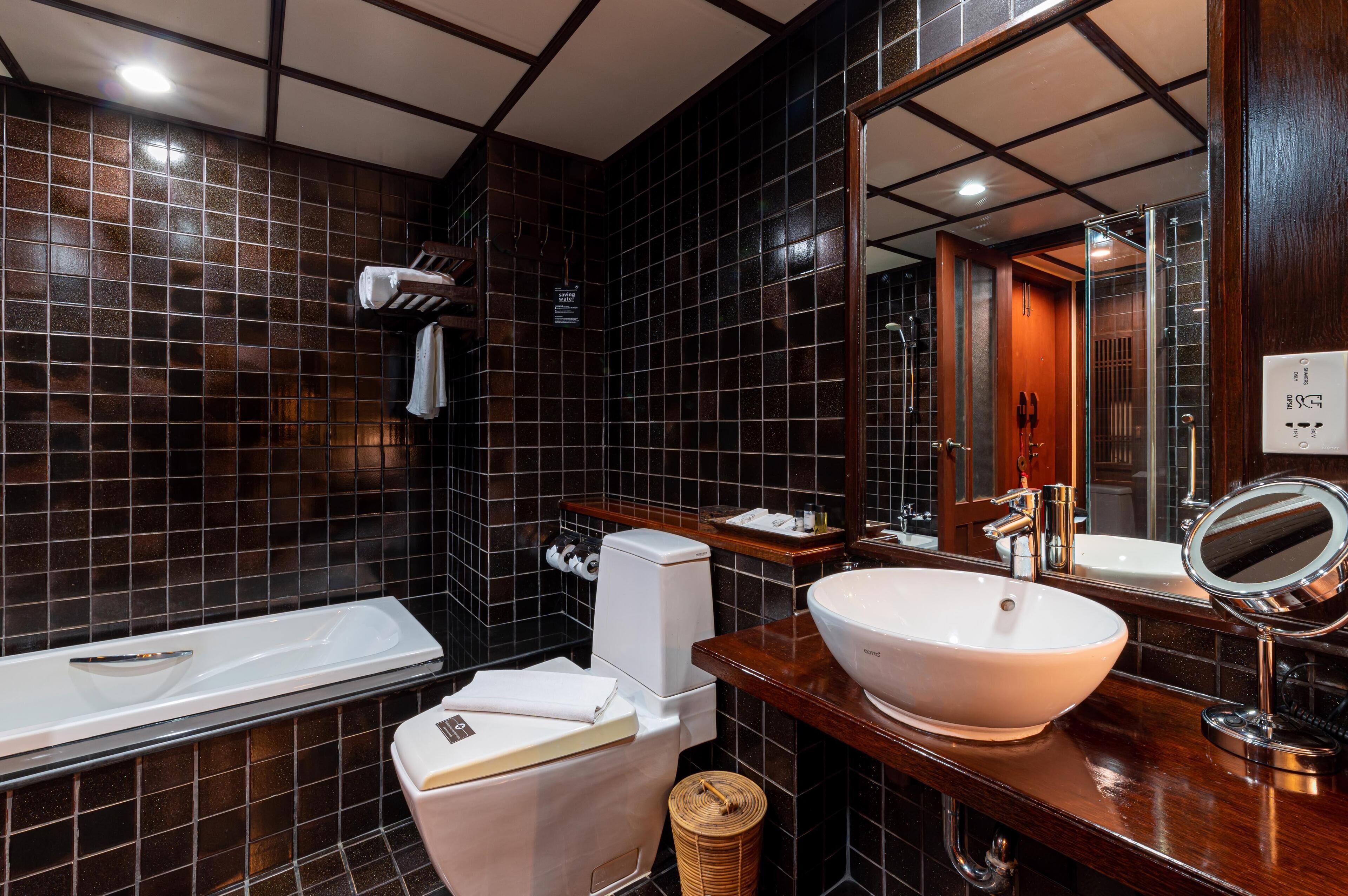 siam chalet room | bathroom | separate bathtub and shower, free toiletries, hair dryer, bathrobes