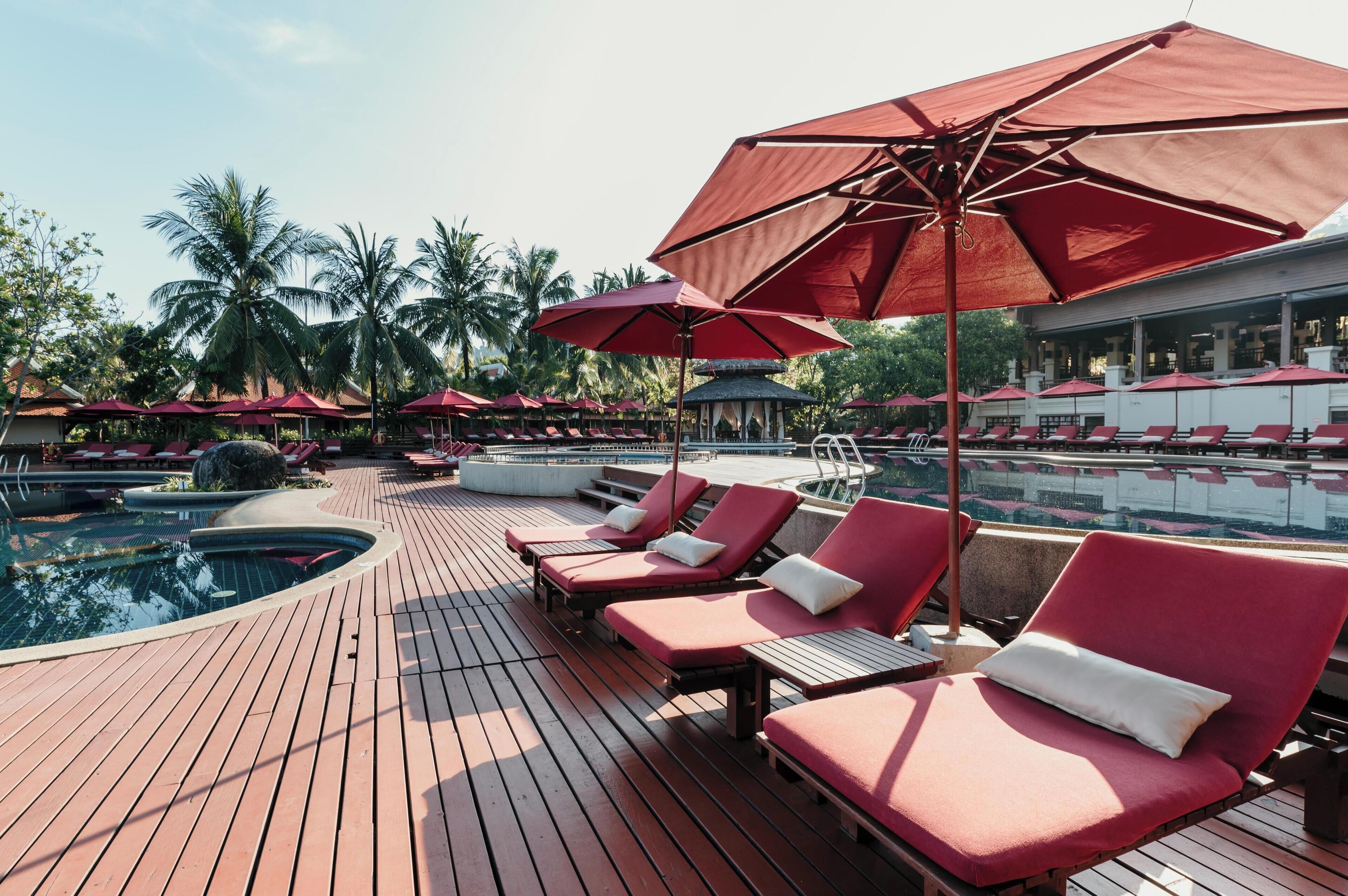 2 outdoor pools, open 7:00 am to 7:00 pm, pool umbrellas, pool loungers