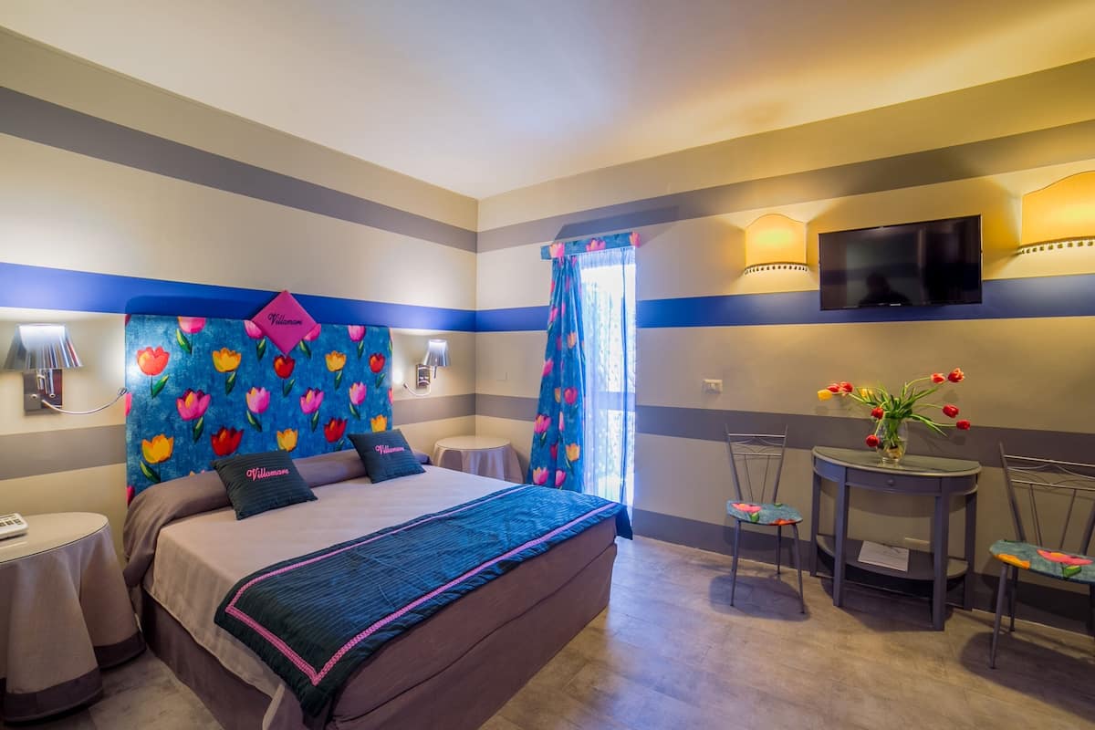 family quadruple room, multiple beds | memory-foam beds, minibar, in-room safe, individually decorated