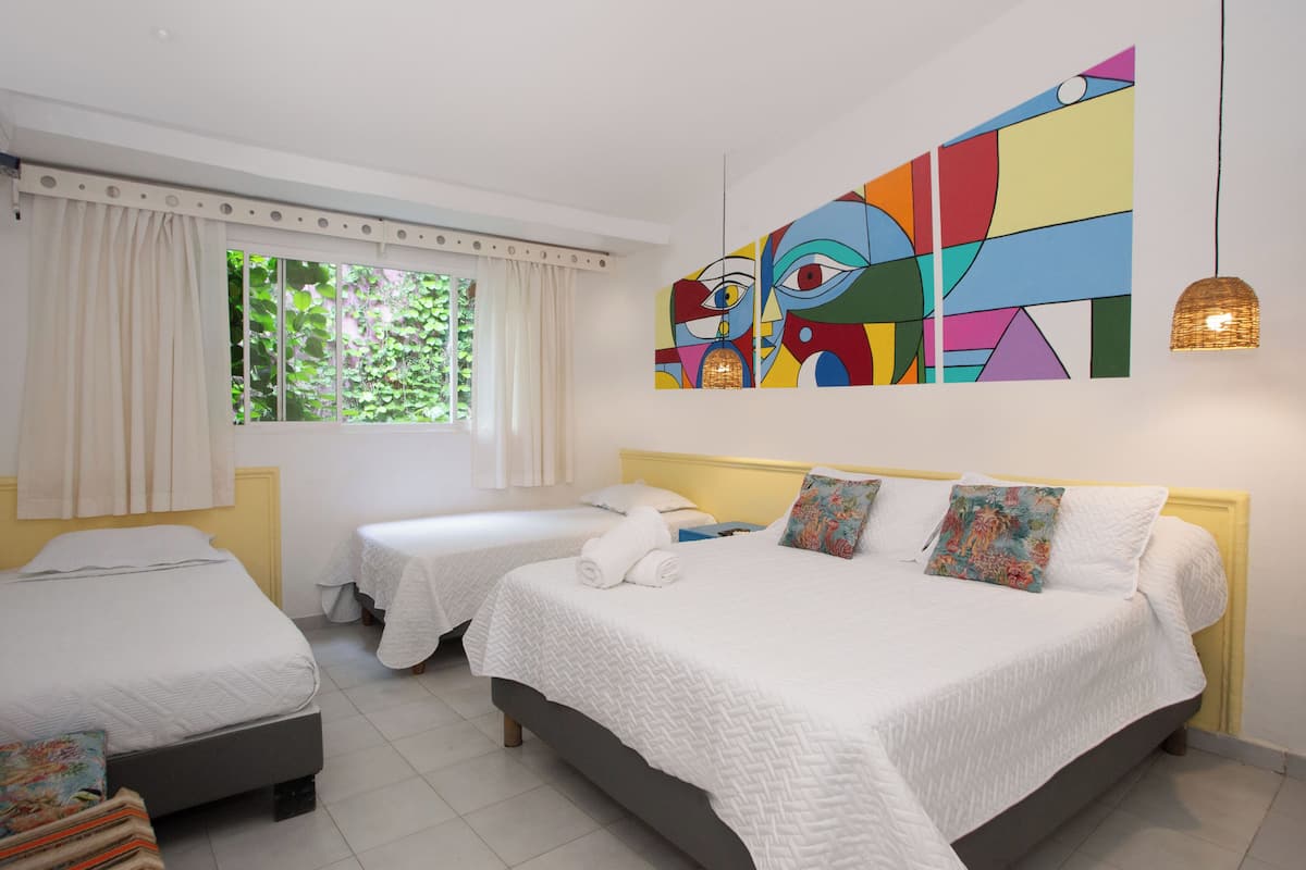 Family Room | 1 bedroom, in-room safe, free WiFi, bed sheets