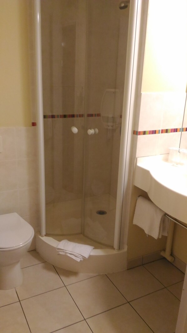 Shower, free toiletries, hair dryer, towels