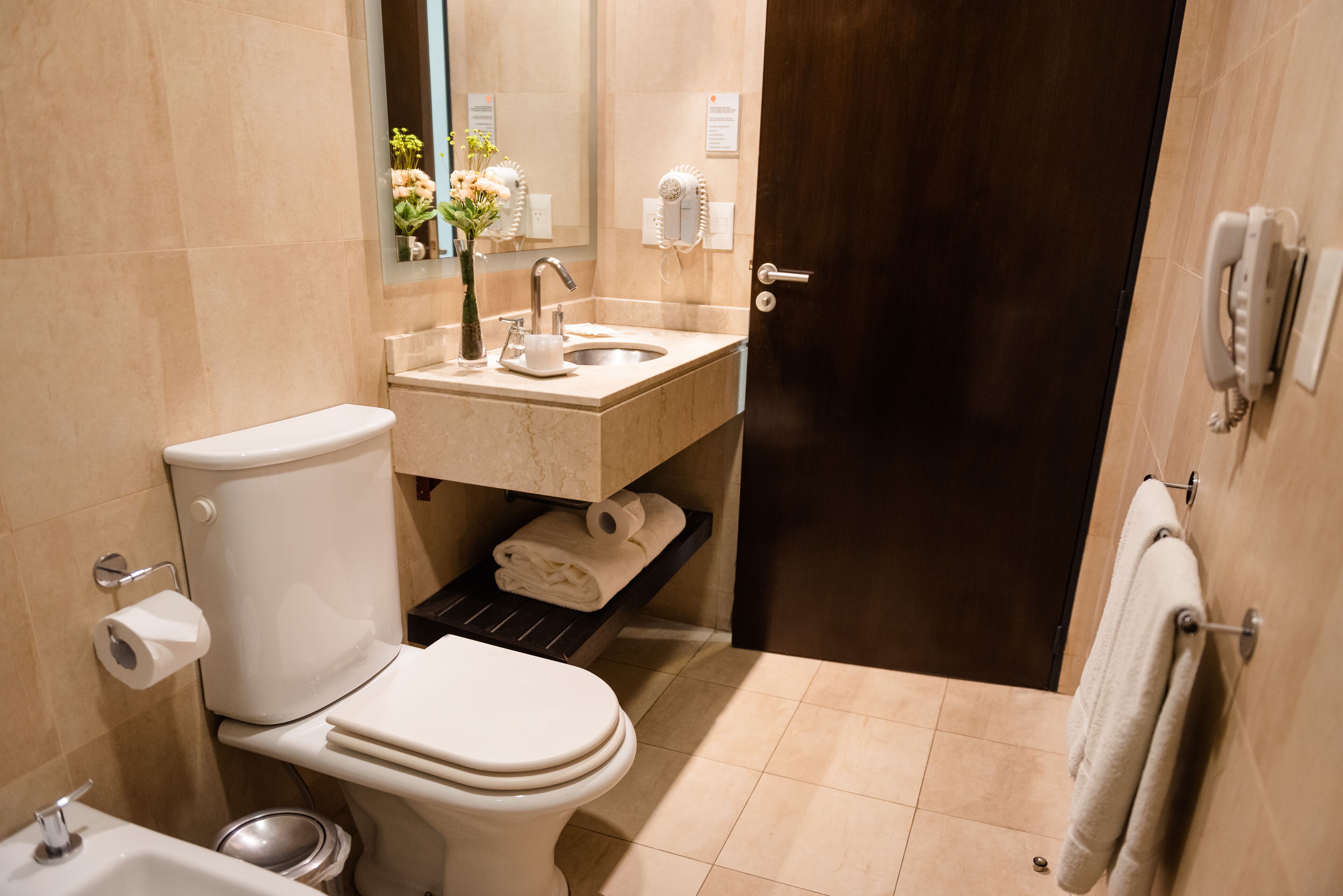 classic suite, 1 king bed | bathroom | rainfall showerhead, free toiletries, hair dryer, bidet