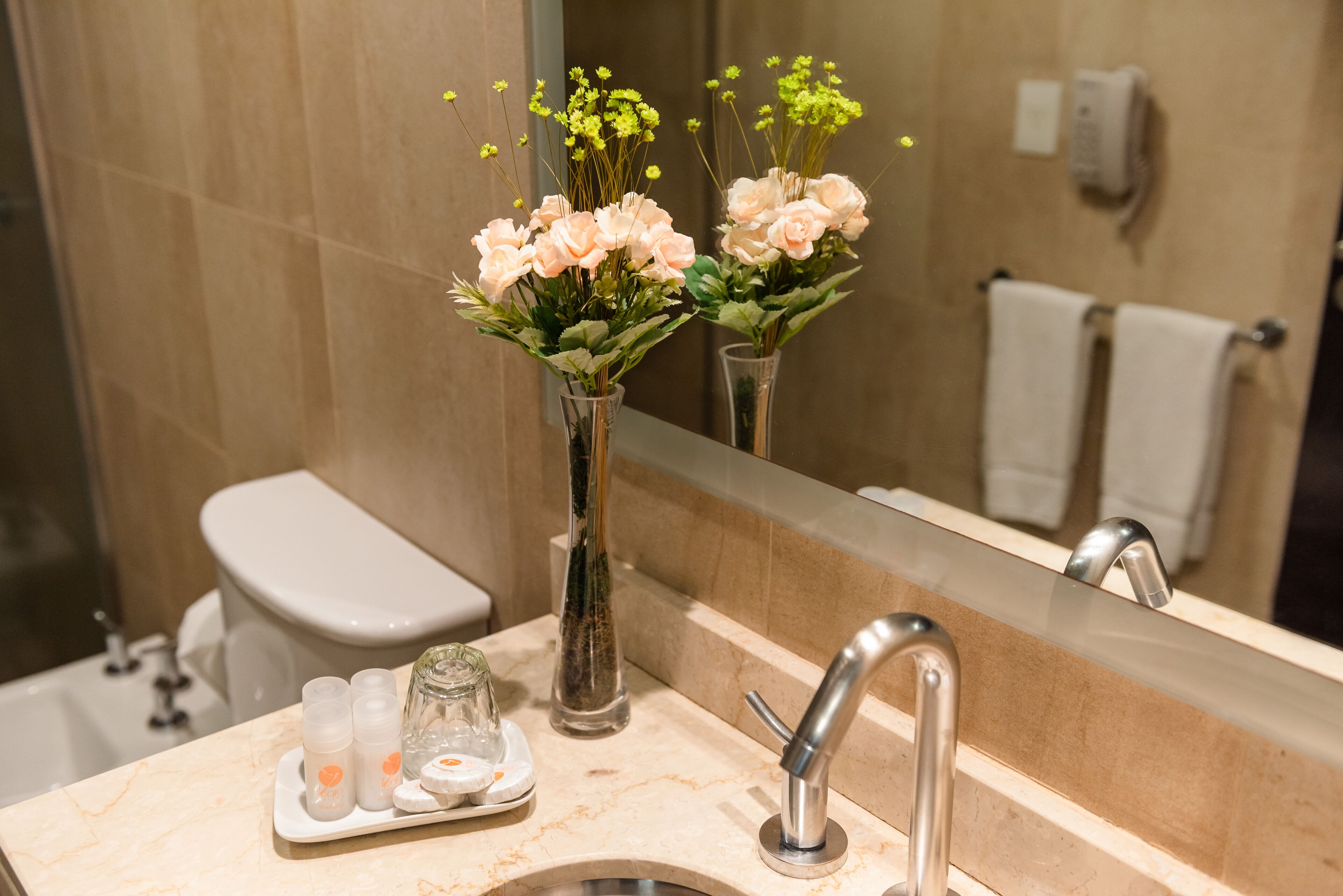 classic suite, 1 king bed | bathroom | rainfall showerhead, free toiletries, hair dryer, bidet